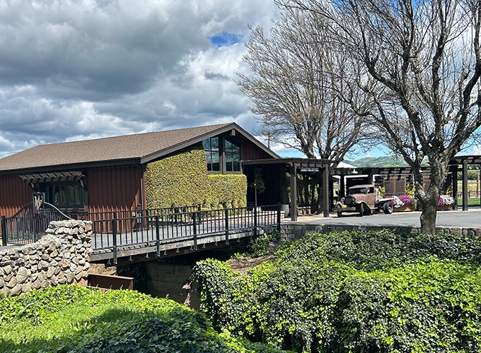 A building with a bridge in front of it