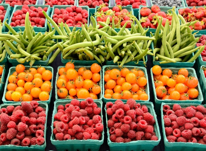 A table filled with lots of different fruits and vegetables.